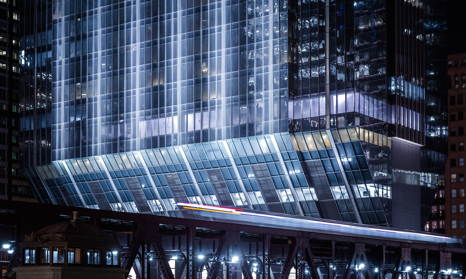 Night view of 150 Riverside office building facade