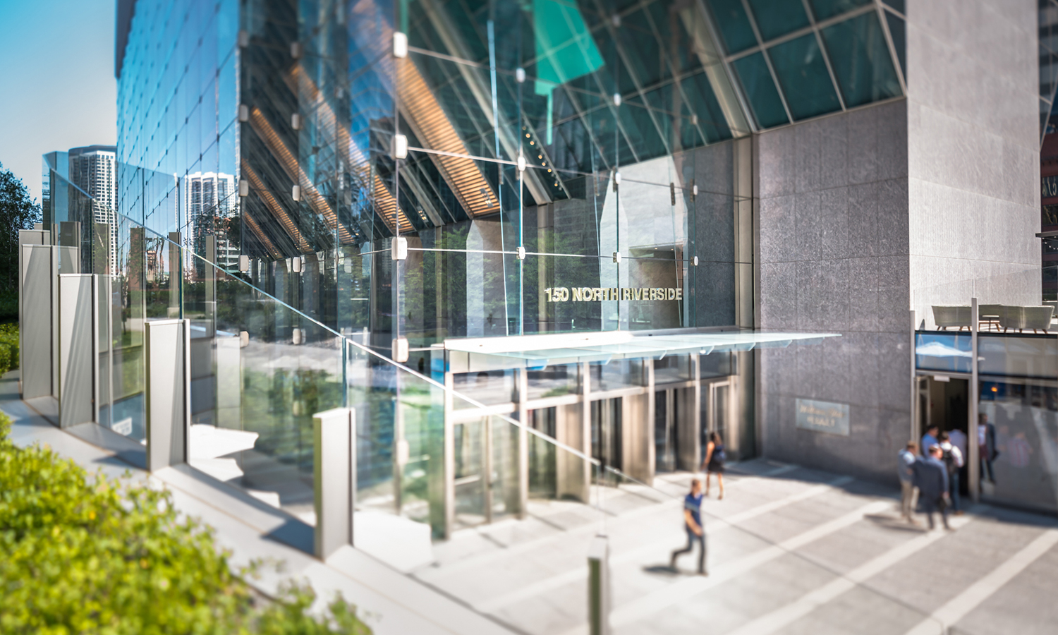 Glass entryway of 150 Riverside office tower
