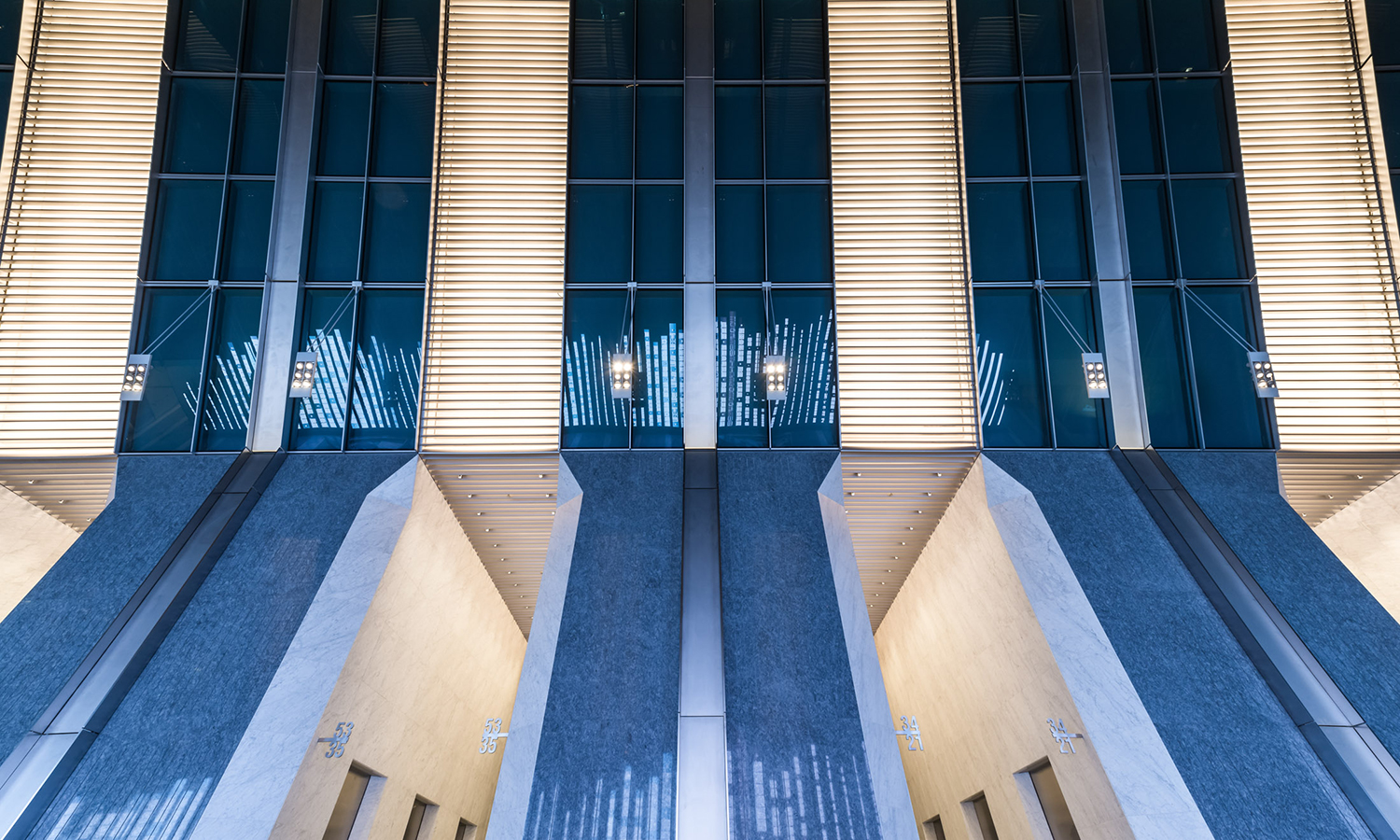 Decorative blue metal facade in 150 Riverside's lobby